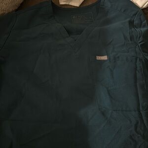 FIGS CARRIBEAN BLUE TOP HARDLY USED